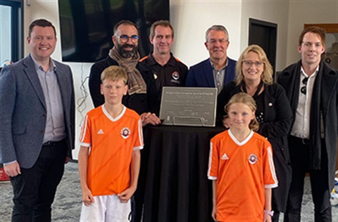 Mayor Steve Staikos, Labor Member for Mordialloc Tim Richardson, Member for Isaacs Mark Dreyfus, MP Ros Spence and members of the junior Stingrays celebrating the official opening of Aspendale Gardens Sports Ground Pavilion