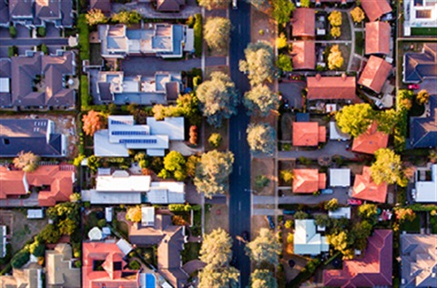 Aerial view of a group of houses in a suburban street