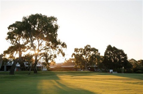 View of sun rising over Rossdale Golf Club.