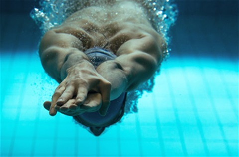 Swimmer diving underwater