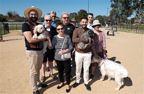 A group of happy dog owners at the opening of the Chadwick Reserve dog park.