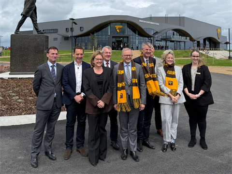 Dignitaries in front of the new facilities at the official opening. 