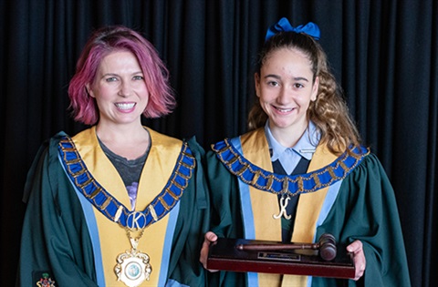 Kingston Mayor Jenna Davey-Burns congratulates new Junior Mayor Isabella Koukoumanos.
