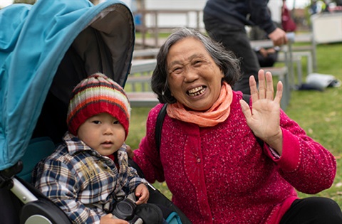 A lady with a little boy waving.jpg